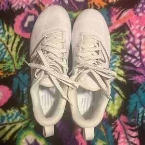 New Balance cleats freeze 8.5 white and gray.